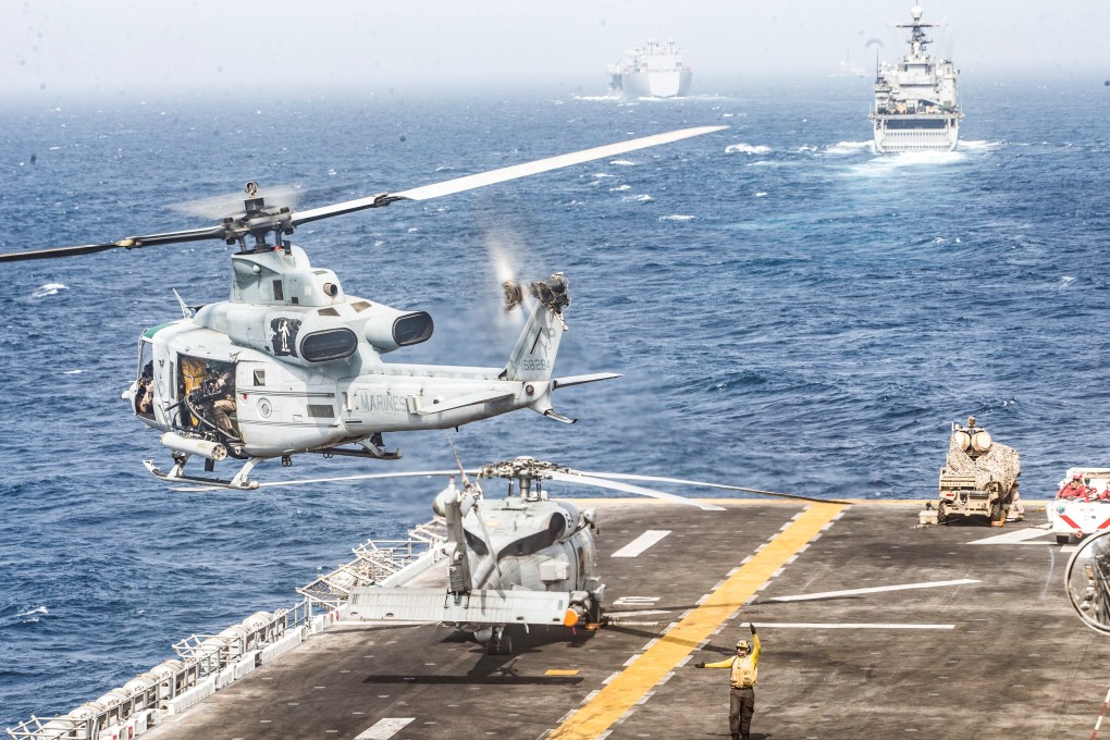A US Marines helicopter takes off from the flight deck of the US Navy amphibious assault ship USS Boxer during its transit through the Strait of Hormuz. File photo: Reuters