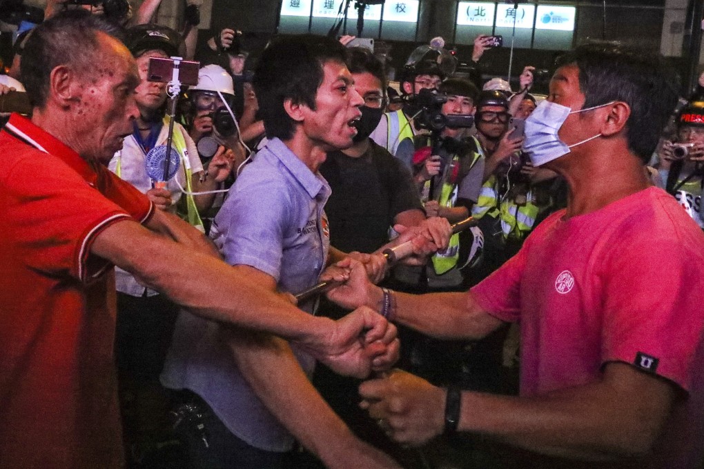 Scuffles break out in North Point on Sunday night. Photo: Felix Wong