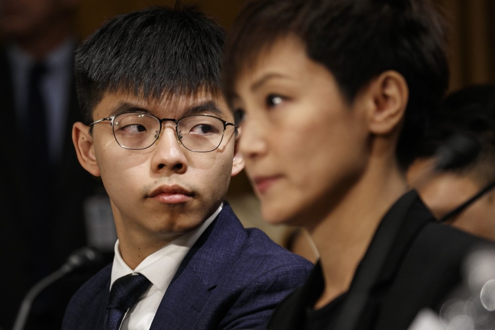 Hong Kong activists Joshua Wong and Denise Ho at a Congressional-Executive Commission on China hearing on Tuesday morning in Washington. Photo: AP