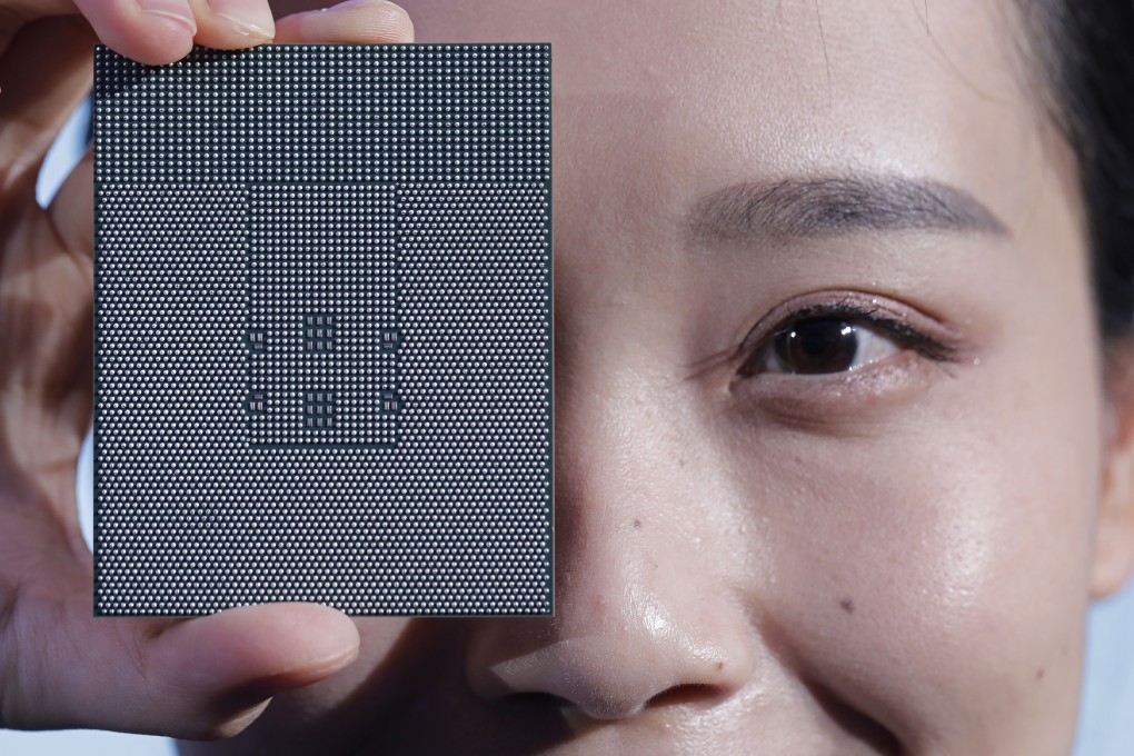 A Kunpeng 920 chip is displayed during an unveiling ceremony in Shenzhen, China, Monday, Jan. 7, 2019. Chinese telecom giant Huawei unveiled a processor chip for data centers and cloud computing as it expands into an emerging global market despite Western warnings the company might be a security risk. (AP Photo/Vincent Yu)