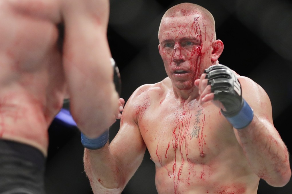 Georges St-Pierre taking on Michael Bisping at UFC 217 in November 2017. Photo: AP