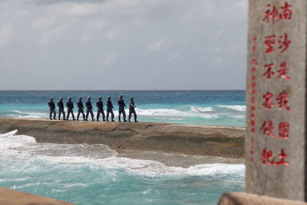 The Chinese navy conducts a patrol in the disputed Spratly Islands, as part of what has been termed militarisation in the South China Sea. Photo: Reuters