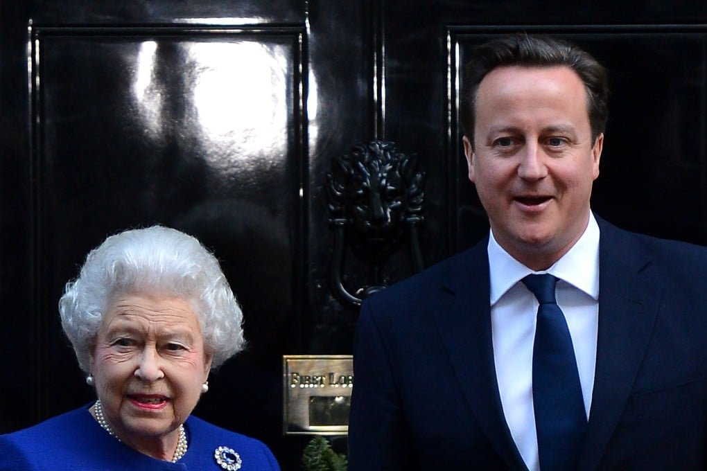 David Cameron pictured with Queen Elizabeth in 2012. Photo: AFP