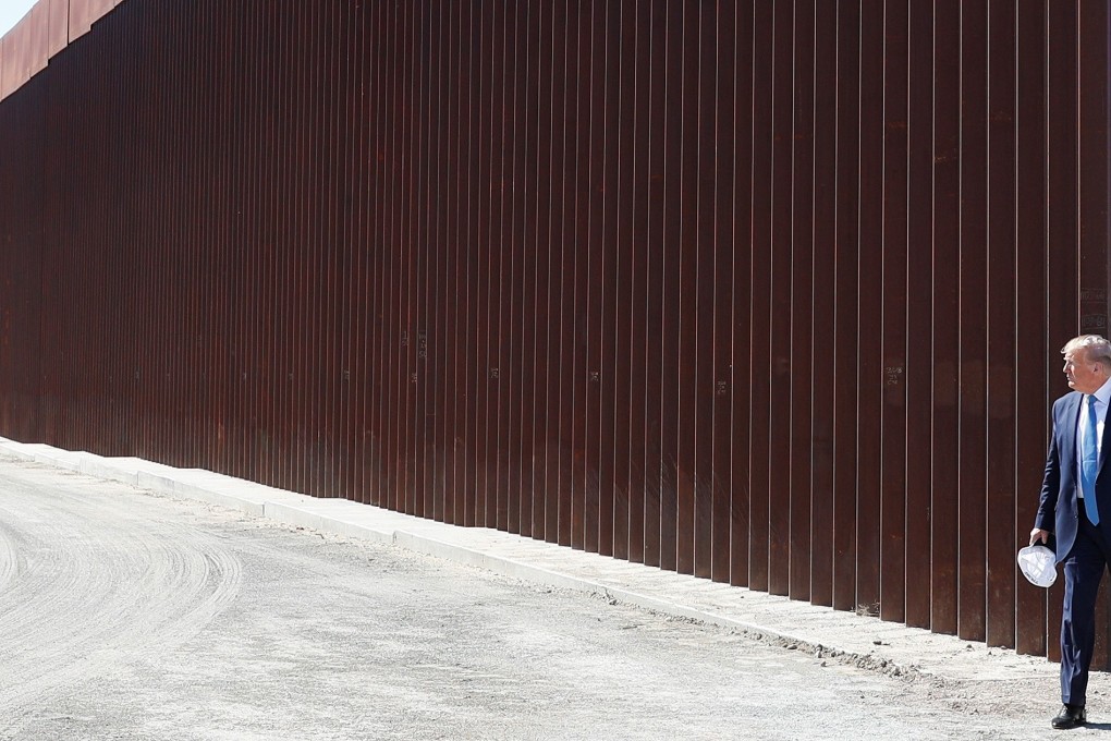 US President Donald Trump visits a section of the US-Mexico border wall in Otay Mesa, California. Photo: Reuters