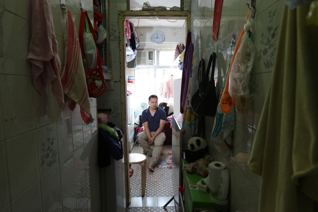 An estimated 200,000 Hong Kong residents live in subdivided flats, while the government sits on nearly over US$1 trillion in reserves. Photo: Felix Wong
