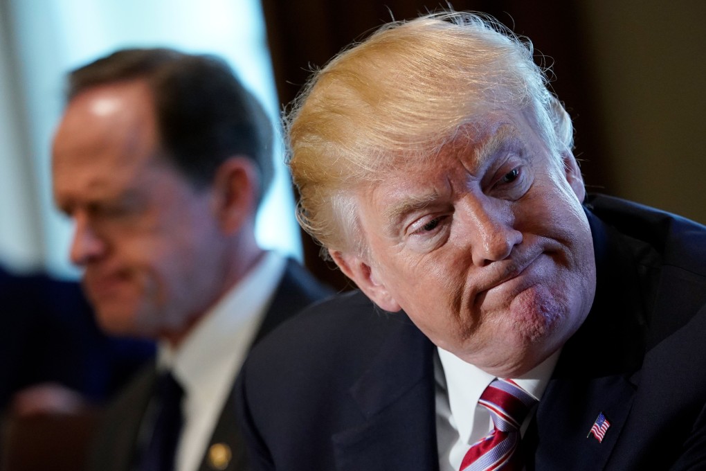 US Senator Pat Toomey (left), a Republican from Pennsylvania, has proposed legislation that would impose limits on a president’s power over imports. US President Donald Trump has imposed hundreds of billions of dollars in punitive import taxes. Photo: AFP