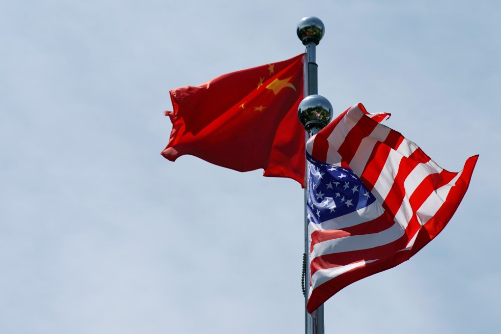 The Chinese and US flags flutter near the Bund on July 30, ahead of a meeting between US trade delegates and their Chinese counterparts in Shanghai. Photo: Reuters