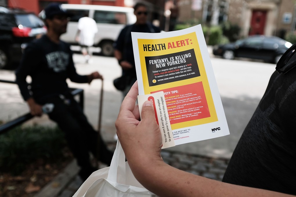 A heroin user reads an alert on fentanyl in New York City. Photo: Getty Images