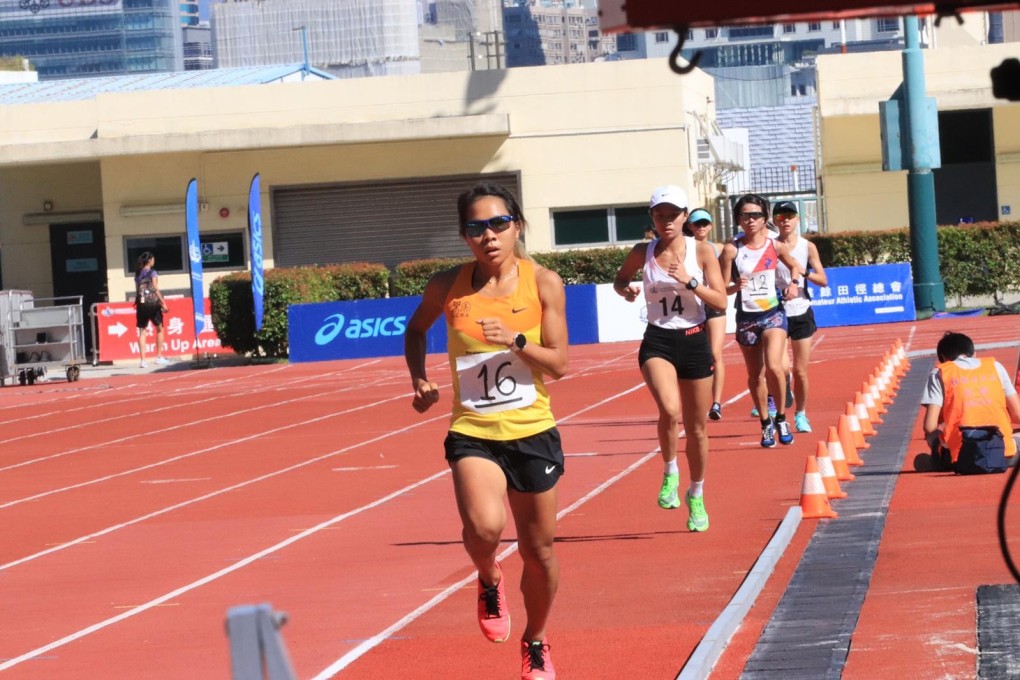 Christy Yiu wins the 5,000m at the Hong Kong Series 4 at Wan Chai Sports Ground. Photos: Chan Kin-wa