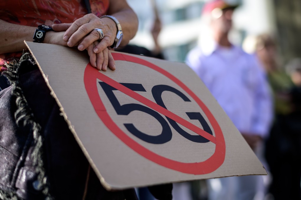 People take part in a national demonstration against 5G technology in Bern. Photo: AFP