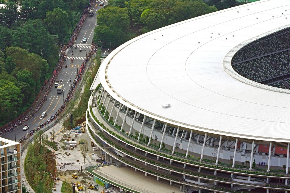 The new National Stadium in Tokyo was promised to be ready in time for the Rugby World Cup, but is still under construction. Photo: Kyodo