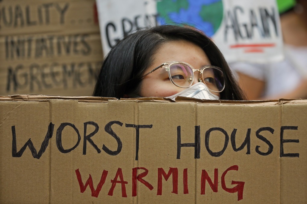 A Malaysian environmental activist takes part in the Global Climate Strike in Kuala Lumpur. Photo: EPA