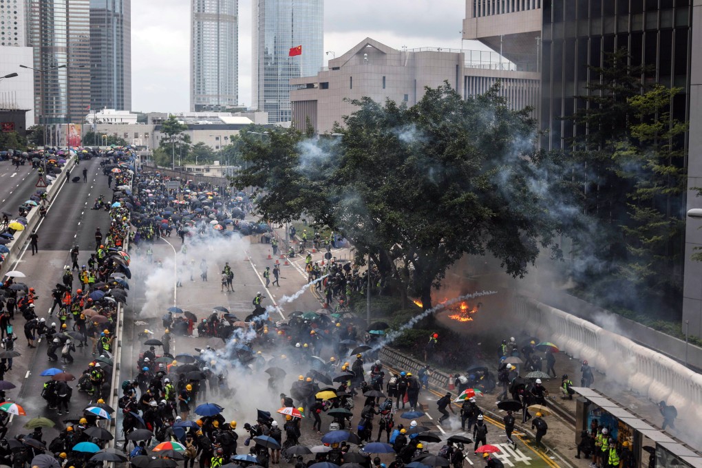 Police fire tear gas at protesters during an anti-government rally in Hong Kong. Photo: EPA-EFE