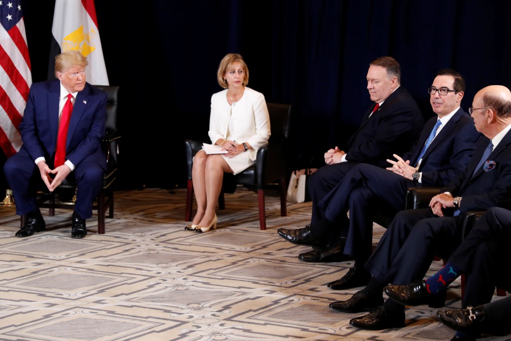 US President Donald Trump (far left) looks on as Treasury Secretary Steven Mnuchin (second from right) explains the Chinese delegation’s cancelled farm visit. Photo: Reuters