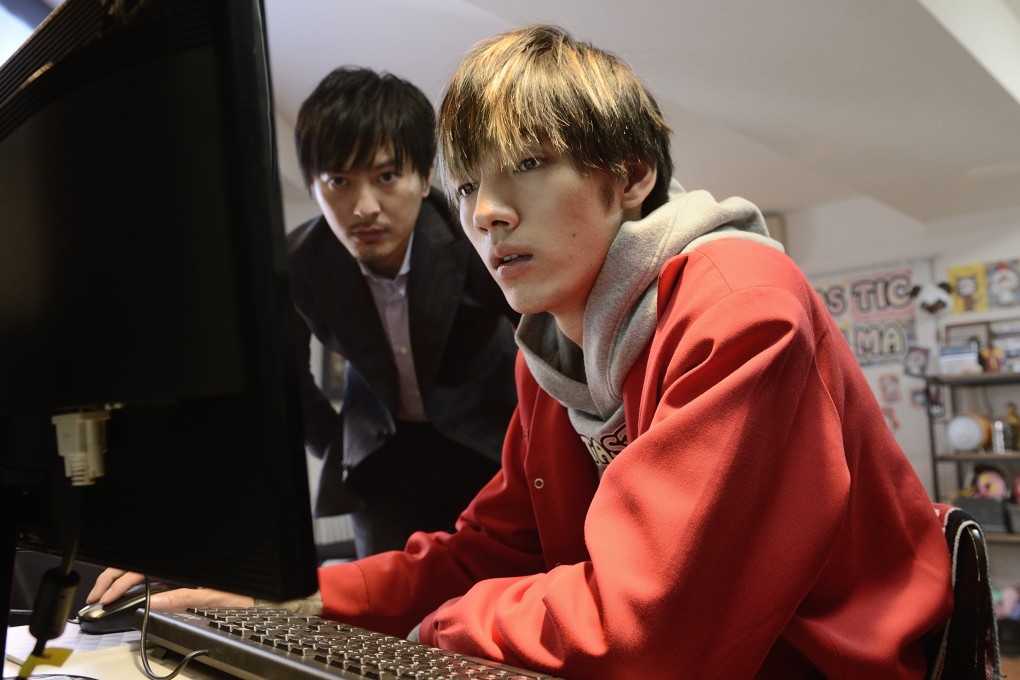 Takashi Tsukamoto (left) and Hiroya Shimizu in a scene from Sadako (category: IIB, Japanese), directed by Hideo Nakata. Elaiza Ikeda and Himeka Himejima co-star.