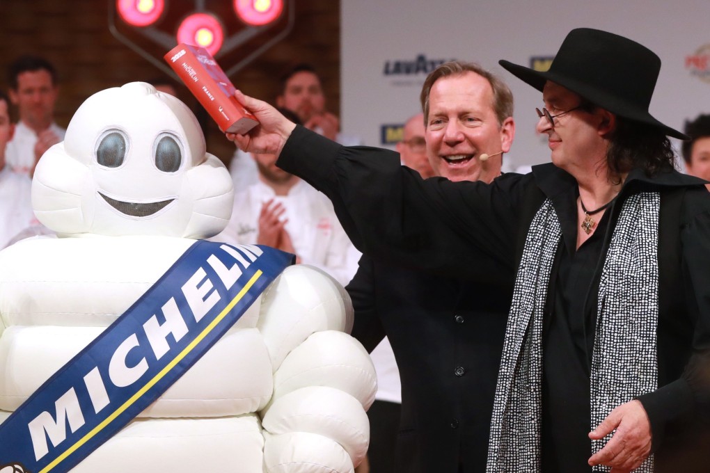 French chef Marc Veyrat celebrates after being awarded the maximum three Michelin stars last February. Photo: AFP
