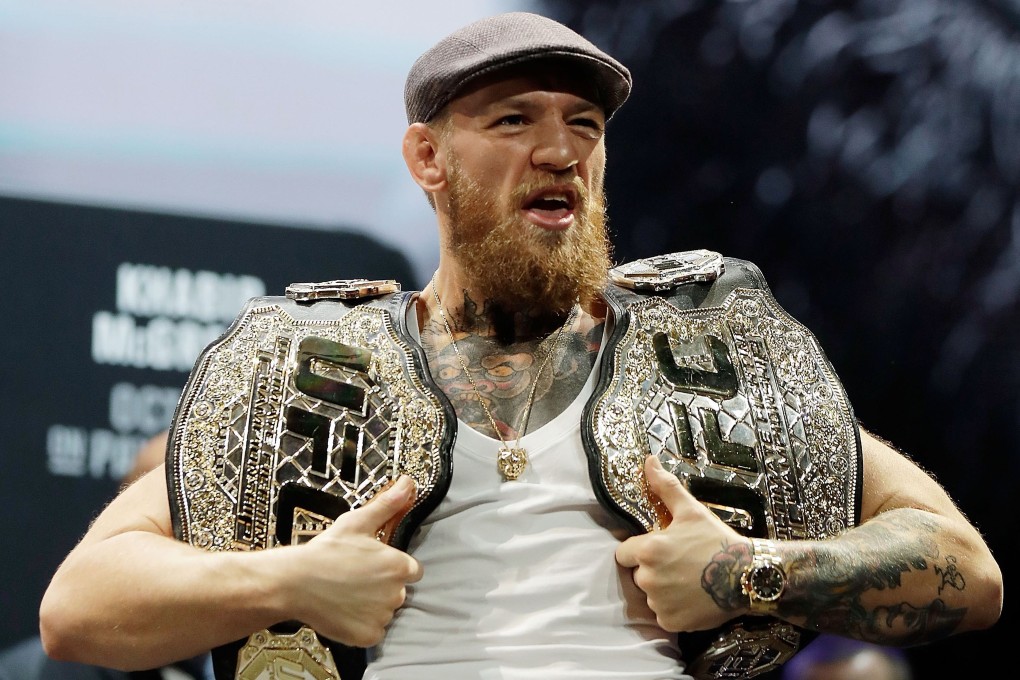 Conor mcgregor championship belts clearance