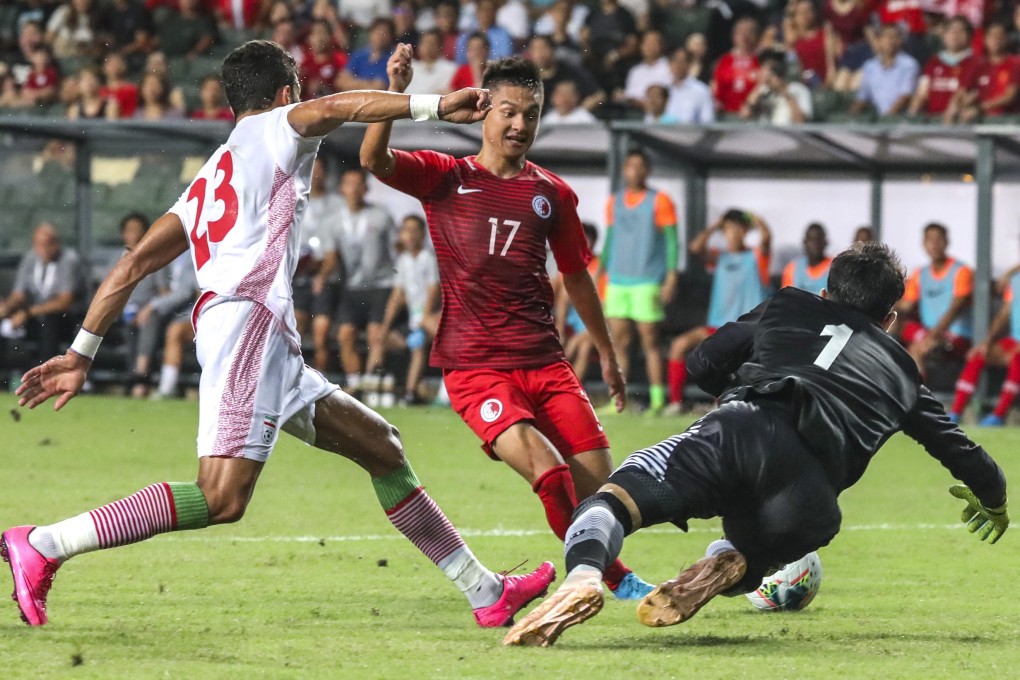 Hong Kong’s Law Tsz-chun (centre) takes on the Iran defence during their 2022 Fifa World Cup qualifying match at Hong Kong Stadium on September 10. Photo: Felix Wong
