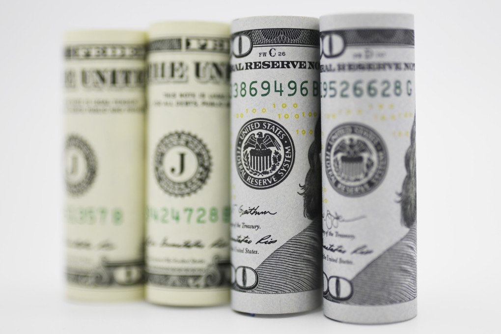 Given the softening global economic outlook, the Federal Reserve’s latest interest rate cut is unlikely to dent the US dollar’s appeal to currency market participants. Photo: Xinhua