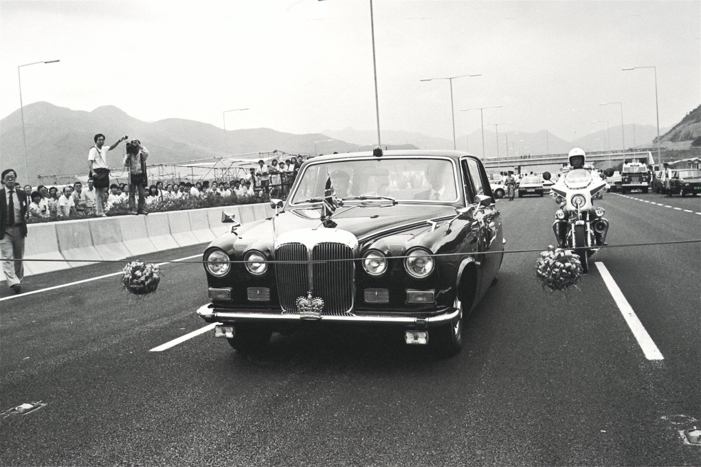 Governor Edward Youde’s car cuts a ribbon to open the Sha Tin to Fanling section of the New Territories Trunk Road on September 24, 1985.