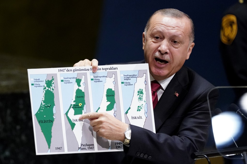 Turkey's President Recep Tayyip Erdogan holds up a map as he addresses the 74th session of the United Nations General Assembly at UN headquarters in New York on Tuesday. Photo: Reuters