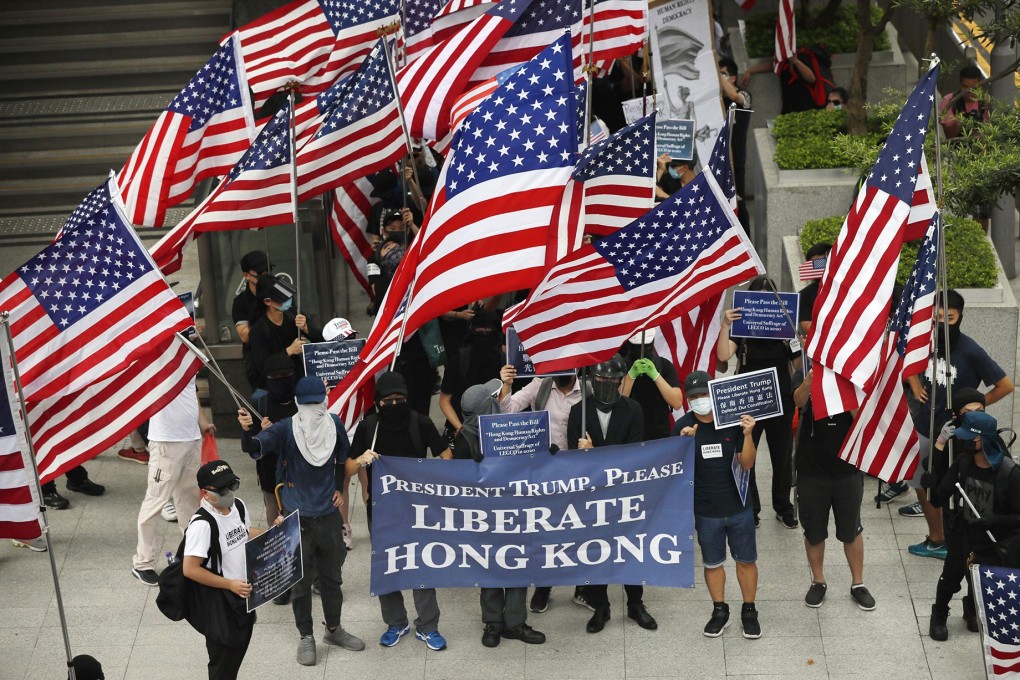 Demonstrators head to the US Consulate in Hong Kong on September 8, calling on American lawmakers to pass legislation in support of the territory's democratic aspirations. Photo: Kyodo