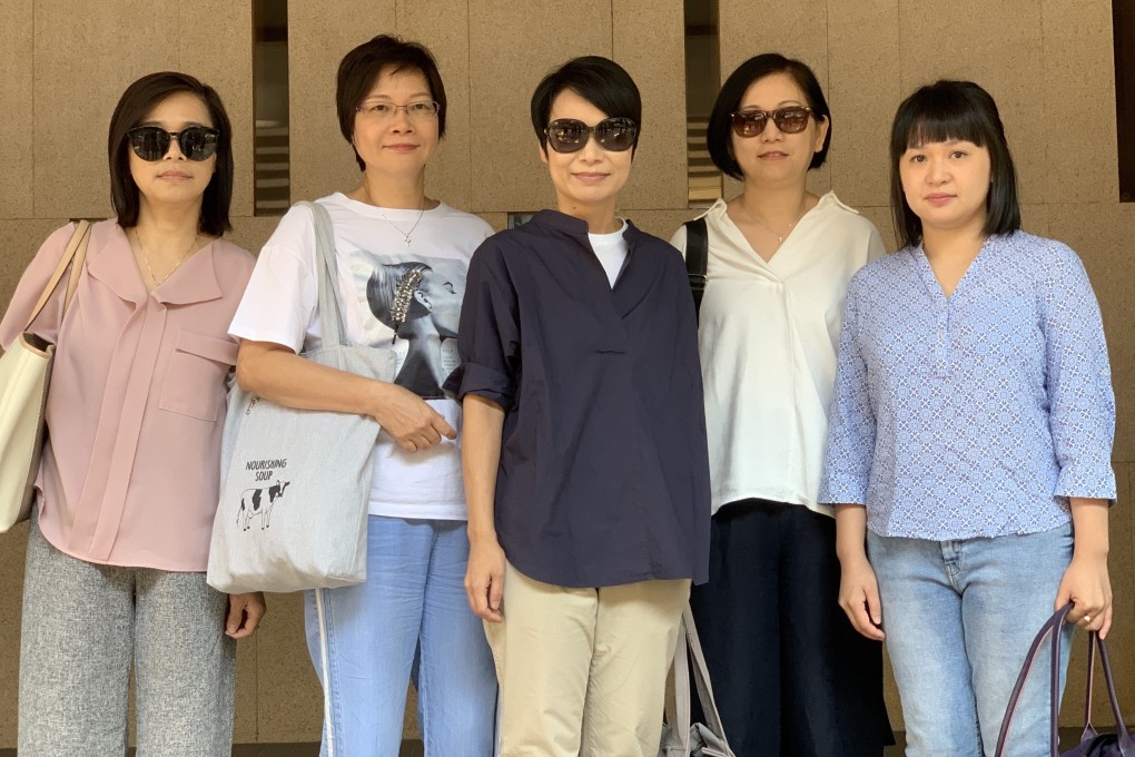 Claimants (from left Au Yuen-fun, Sandra Ng, Candice Tung and Yetta Yiu with Erica Chan, vice-chairman of Cathay Pacific Airways Flight Attendants Union. Photo: Jasmine Siu