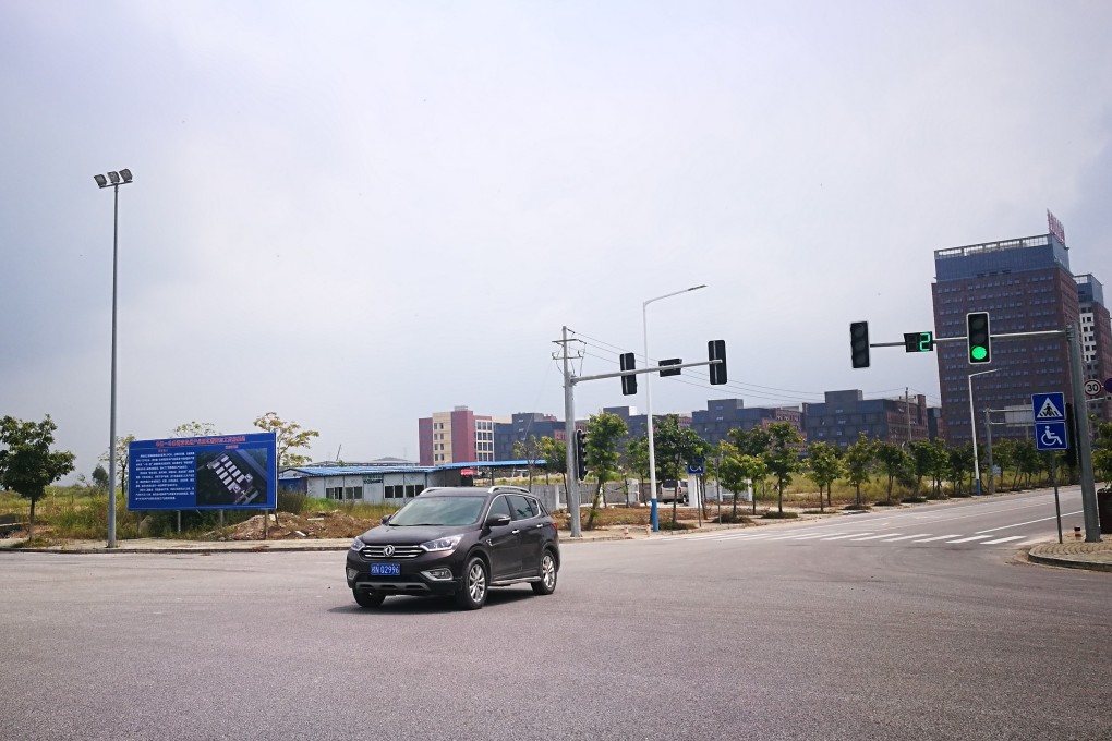Seven and half years after the China-Malaysia Qinzhou Industrial Park opened, the first phase of the park, which covers an area about a tenth the size of Hong Kong Island, is still struggling to find enough business to fill its largely empty units. Photos: He Huifeng