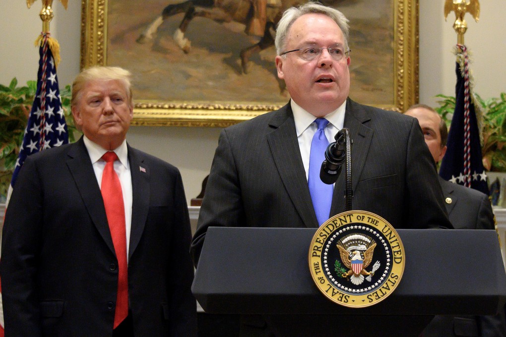 Jim Carroll, director of the United States’ drug control policy office, speaks at the White House as President Donald Trump looks on. Photo: AFP