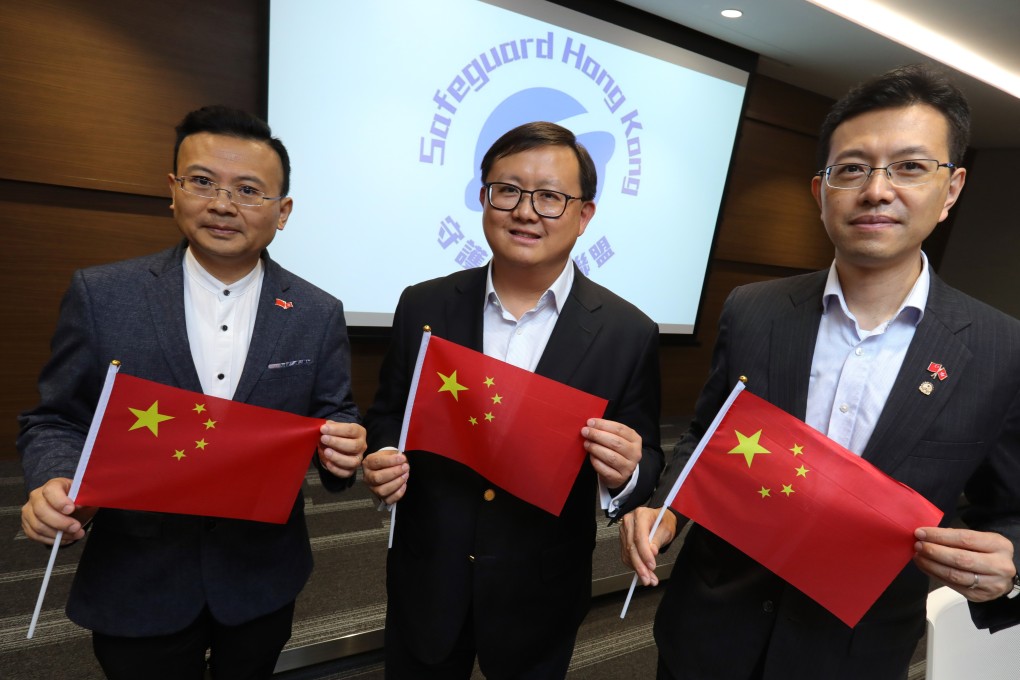 Kennedy Wong, flanked by Democratic Alliance for the Betterment and Progress of Hong Kong vice-chairman Brave Chan Yung (left) and Federation of Trade Unions head Stanley Ng Chau-pei. Photo: May Tse