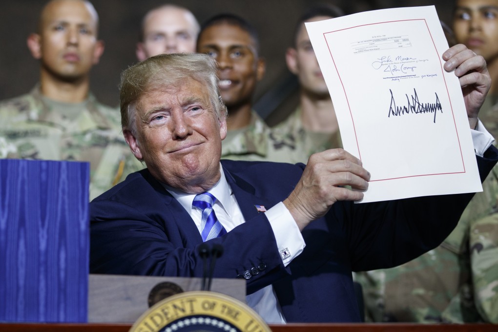 US President Donald Trump in 2018 after signing a US$716 billion defence policy bill that included the expansion of the oversight powers of the Council on Foreign Investment in the US (CFIUS). Photo: AP