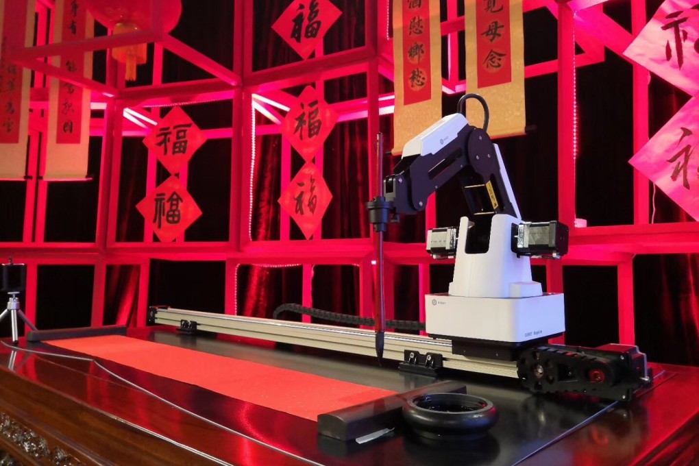 Dobot Magician, a product Yuejiang Technology develops, is writing Chinese calligraphy with a pen-like end effector. Photo: Handout