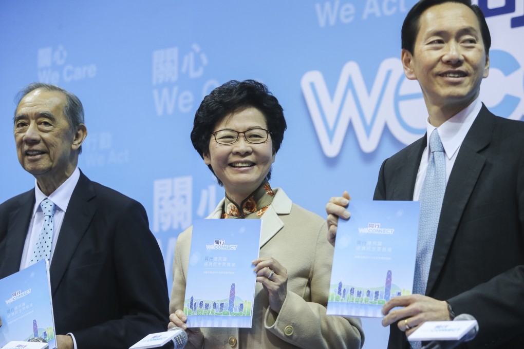Helping then chief-executive hopeful Carrie Lam launch her election manifesto are Ronald Arculli (left) and Bernard Chan, in Mong Kok in February 2017. Photo: Sam Tsang