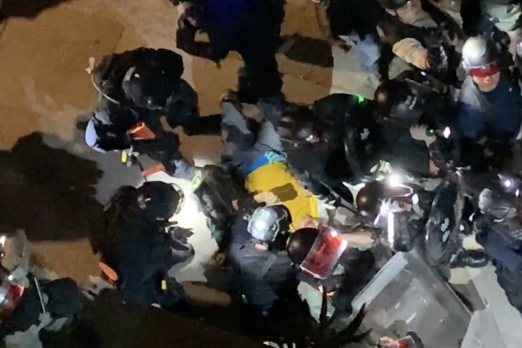 Police have come under fire for saying officers had kicked a “yellow object” in a video of a suspect being arrested. Photo: Facebook