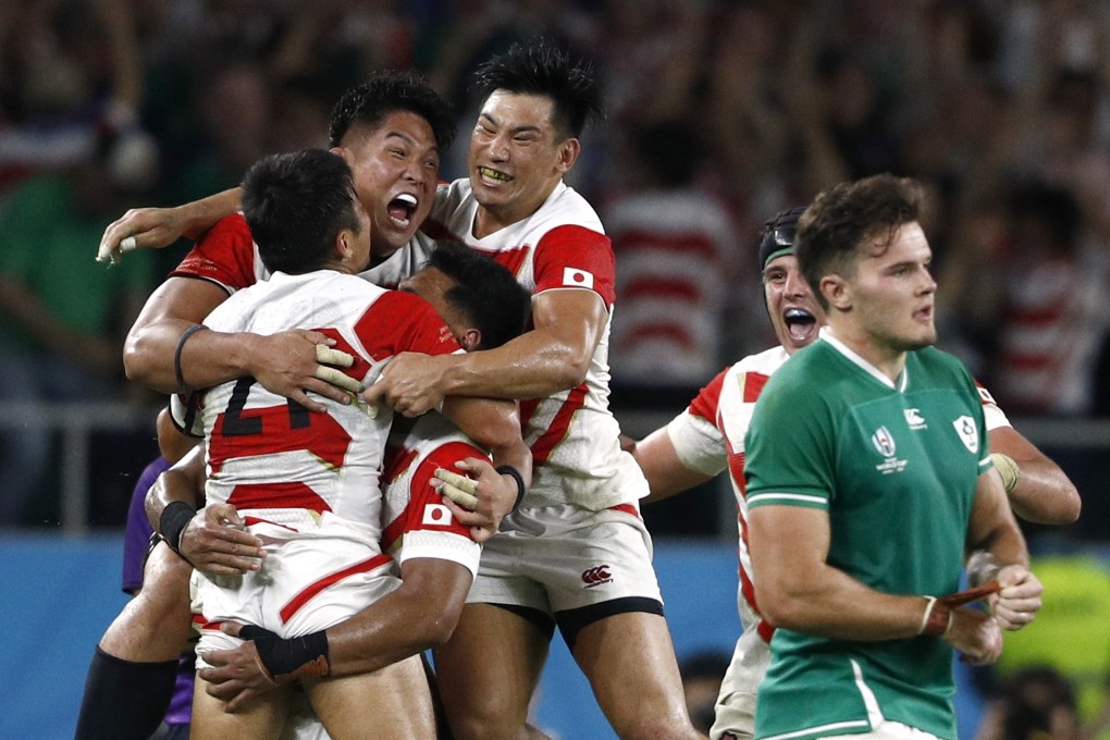 Japan players celebrate defeating Ireland in a massive upset at the Rugby World Cup. Photo: Reuters