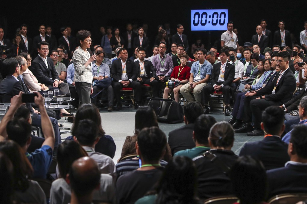 Hong Kong Chief Executive Carrie Lam meets the public during a community dialogue at Queen Elizabeth Stadium in Wan Chai. Photo: Winson Wong