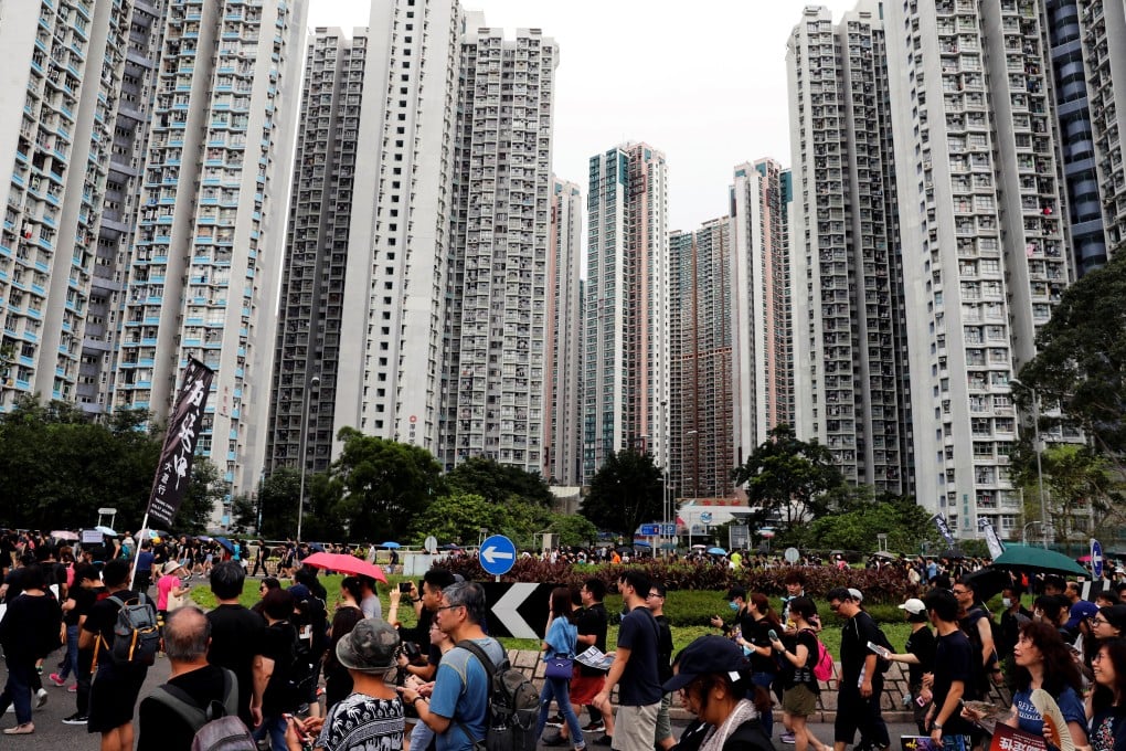 Protesters march in Tseung Kwan O, a residential district in Hong Kong, on August 4. Photo: Reuters