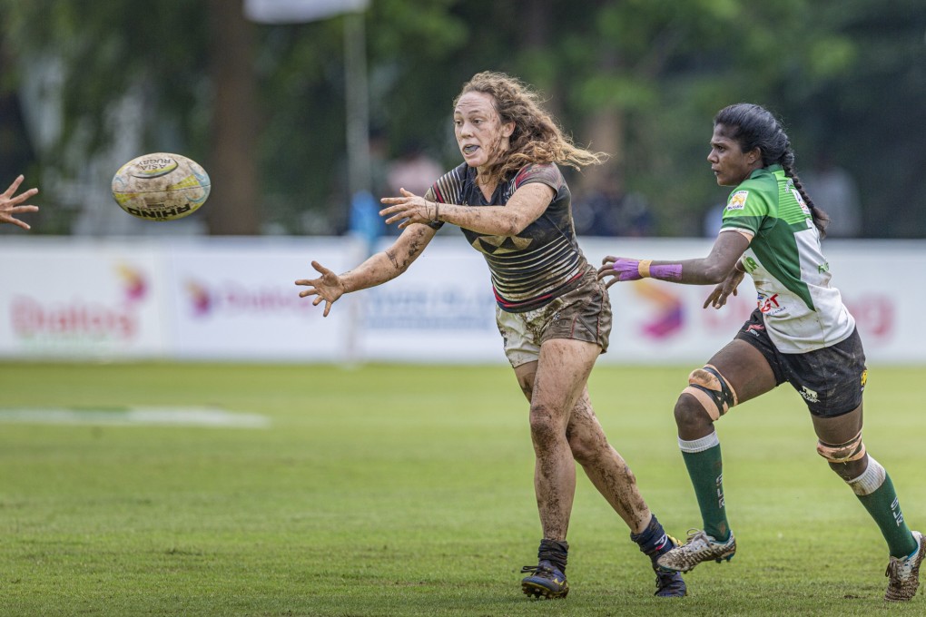Sarah Lucas during the muddy final leg of the Asia Rugby Sevens Series in Sri Lanka. Photo: Asia Rugby