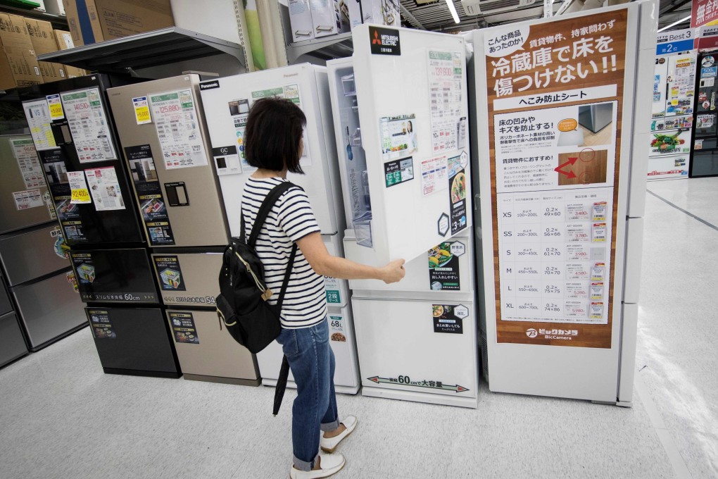 Retailers have been cautious about offering aggressive discounts before the consumption tax is lifted to 10 per cent from 8 per cent on October 1. Photo: AFP