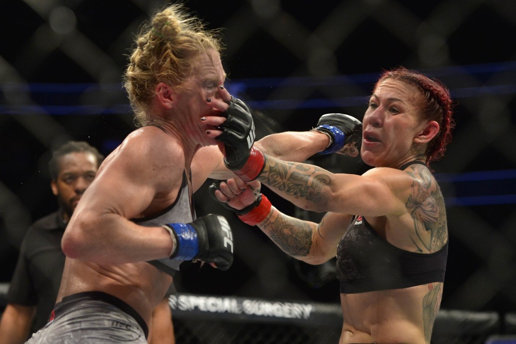 Cris Cyborg lands a hit against Holly Holm (left) during UFC 219 at T-Mobile Arena in December 2017. Photo: USA Today Sports