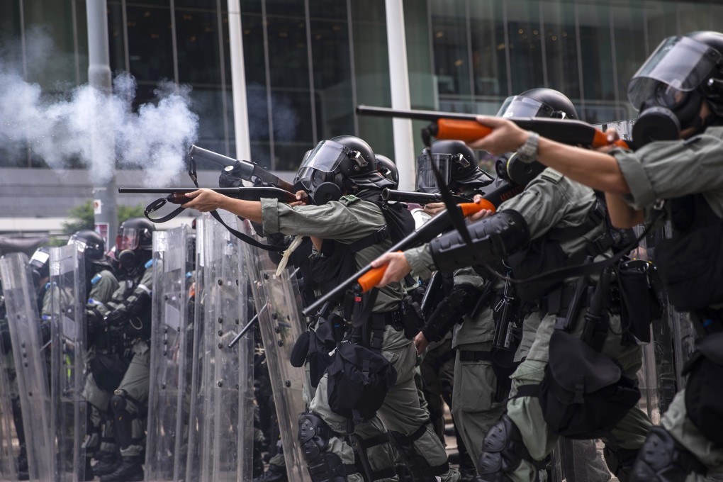 Indonesian journalist Veby Indah’s legal representative Michael Vidler says police violated internationally accepted norms of using weapon by firing from potentially lethal distance and low angle. Photo: Bloomberg
