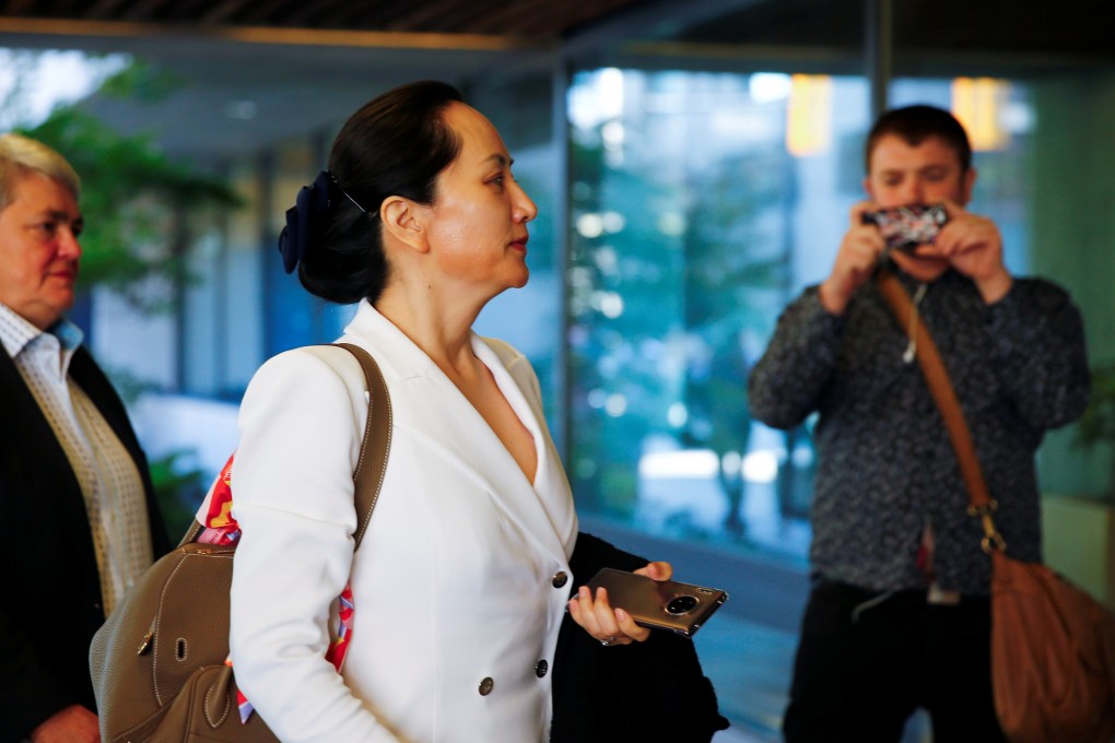 Huawei executive Meng Wanzhou returns to the British Columbia Supreme Court after a lunch break during a hearing in Vancouver on Monday. Photo: Reuters