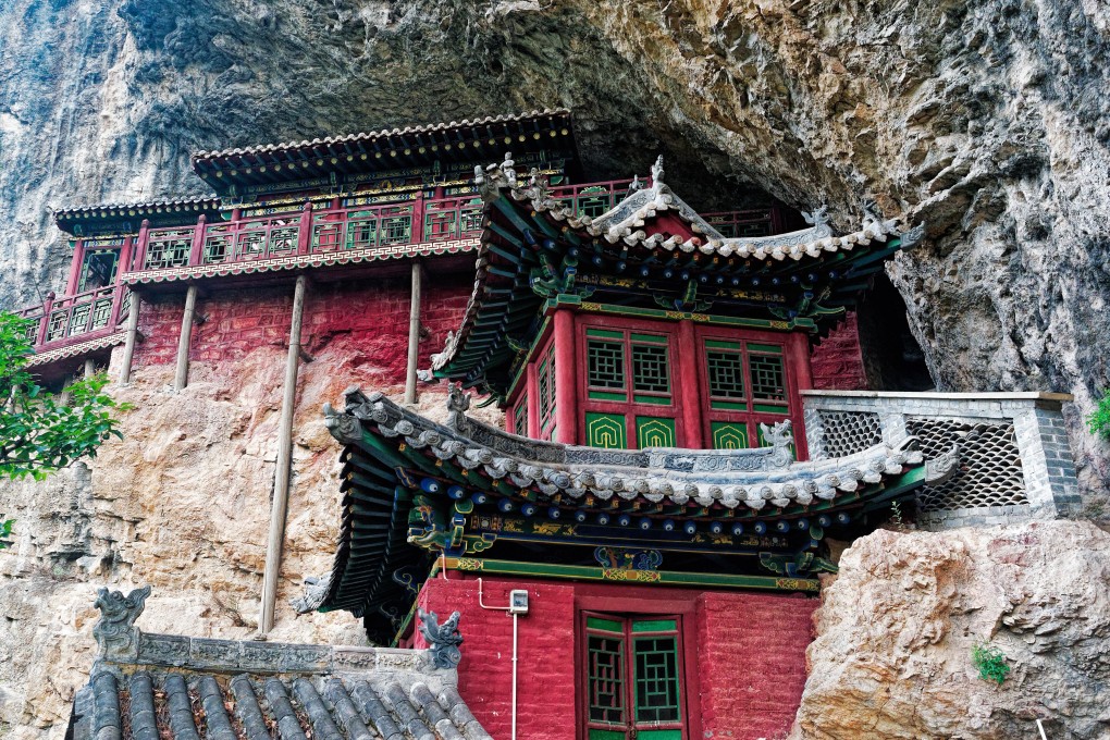 A temple building fixed to the cliff face at Shengshou Temple in Qinyuan county, Shanxi province. Photo: Martin Williams