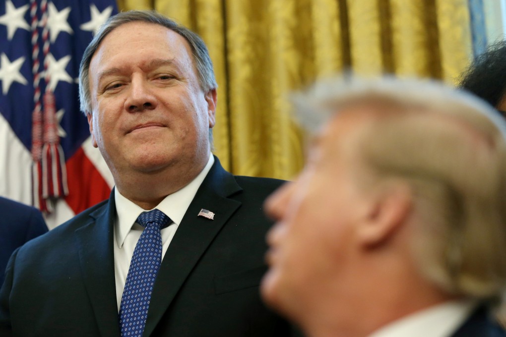 US President Donald Trump (right) calls on Secretary of State Mike Pompeo to speak during a presidential memorandum signing in the Oval Office in February. Photo: Reuters