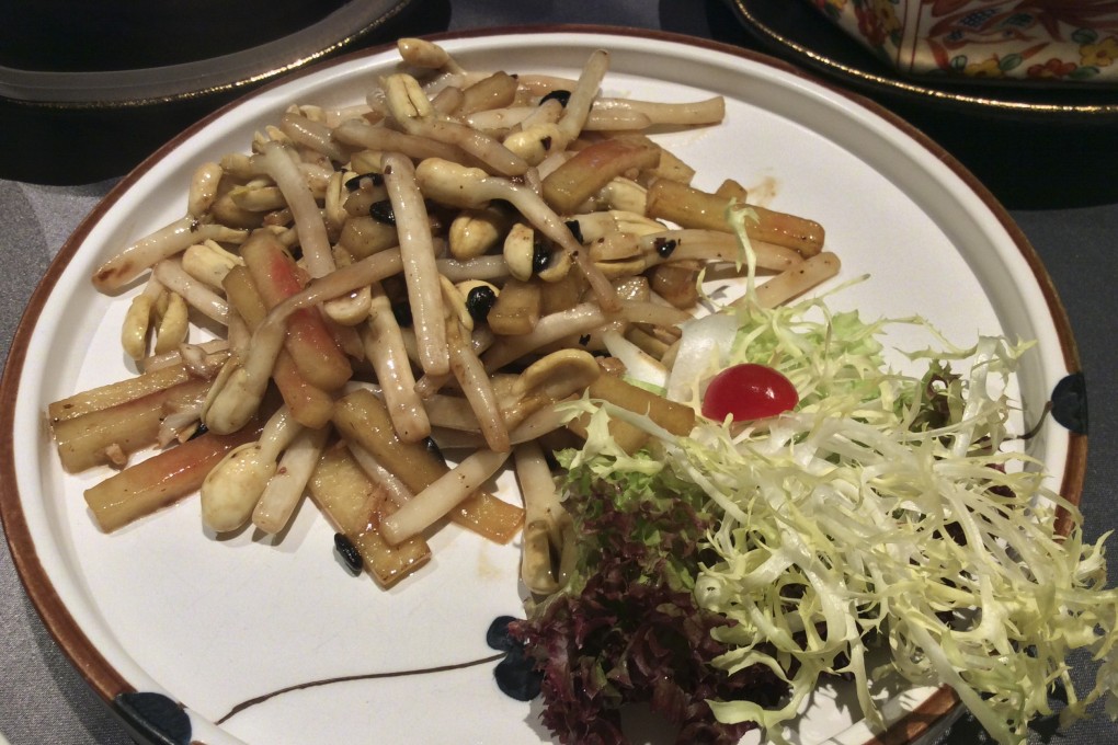 Watermelon rind with peanut sprouts and black beans at Chuan Palace – our favourite dish of the night. Photo: Susan Jung