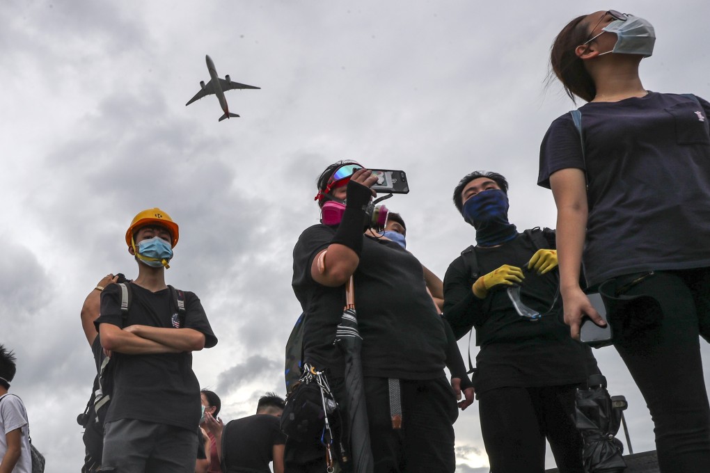 An aircraft takes off from Hong Kong International Airport, as anti-government protesters plan to disrupt transport services to the airport, on September 1, 2019. Photo: Sam Tsang