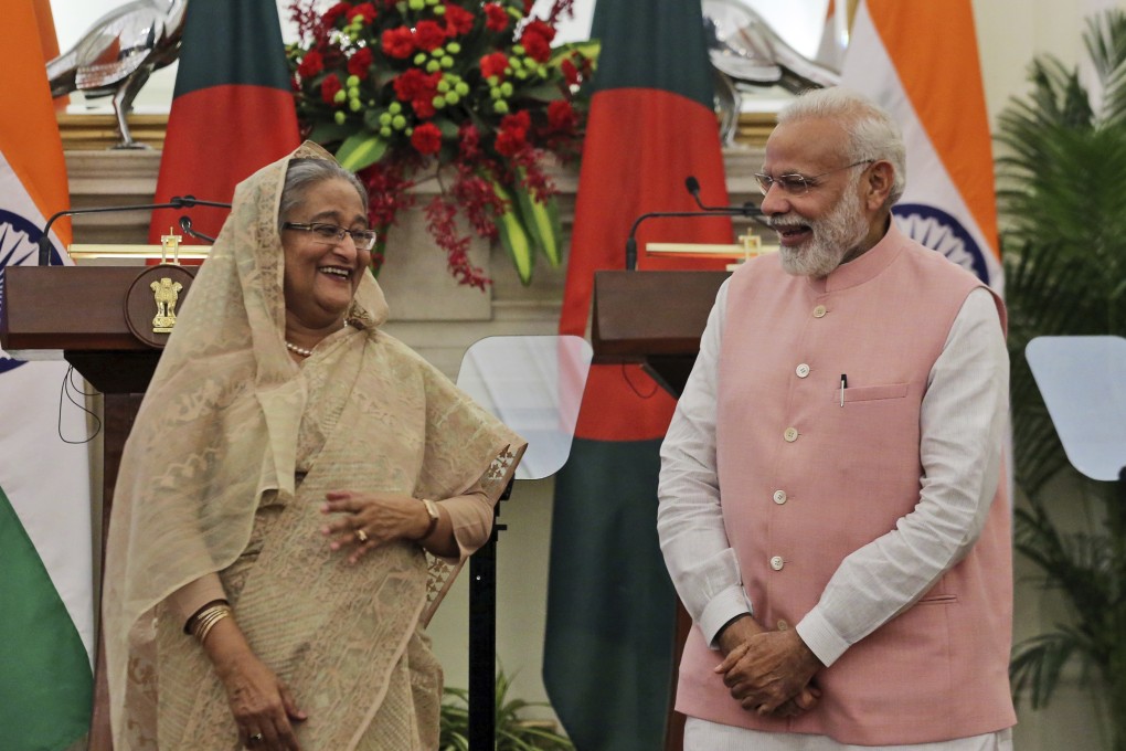 Indian Prime Minister Narendra Modi and his Bangladeshi counterpart Sheikh Hasina share a laugh in 2017. Photo: AP