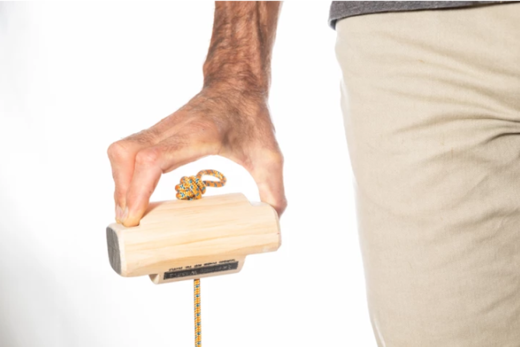 Awesome Woodys climbing training tool is one of many ways to improve your grip strength. Photo: Awesome Woodys