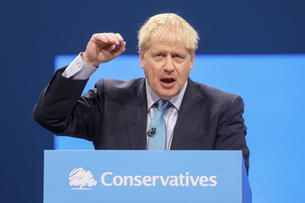 British Prime Minister Boris Johnson delivers his keynote speech on the closing day of the annual Conservative Party conference at Manchester Central on Wednesday. Photo: Bloomberg
