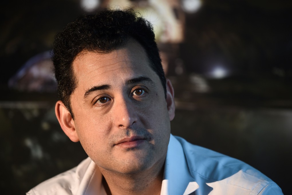 The Cave director Tom Waller talks about the claustrophobic and realistic conditions during the dramatisation of the incredible rescue of the youth soccer team in Thailand. Photo: AFP/Lillian Suwanrumpha